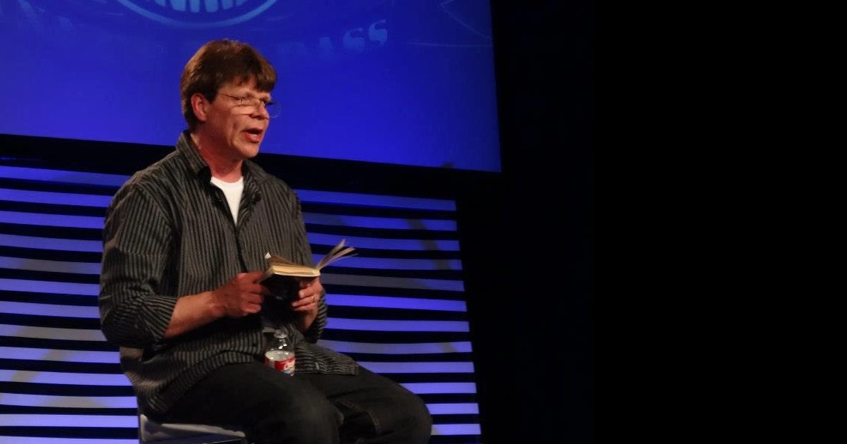 Rob Fore speaking on stage