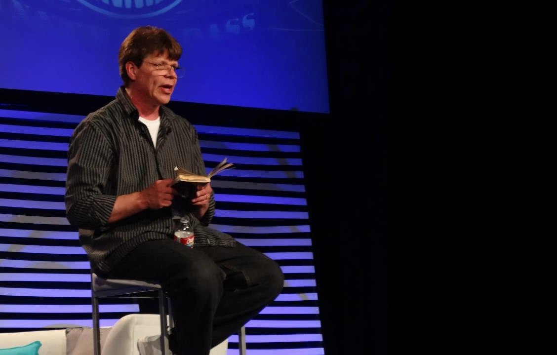 Rob Fore speaking on stage